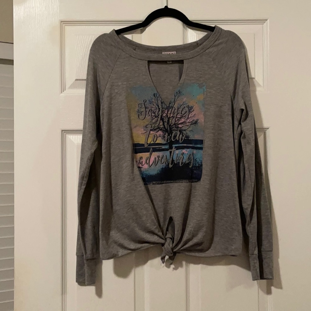 Gray long sleeve shirt with slit in the middle